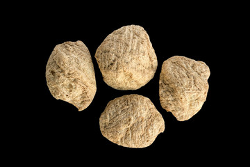 Textured vegetable protein on black background.