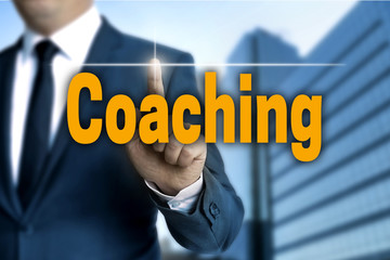 coaching touchscreen is operated by businessman
