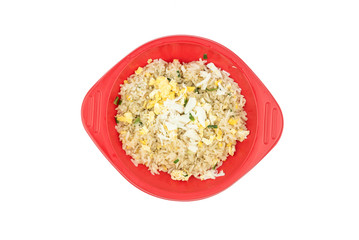 Fried rice with crabmeat on red dish