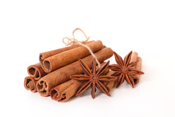 cinnamon and anise isolated on white