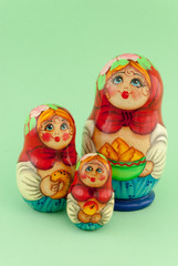 Matryoshka isolated on green background