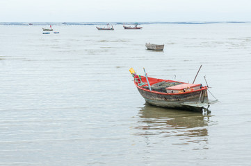 Fototapeta premium Small fishing boat at seaside of Bangpra, Chonburi province,thailand