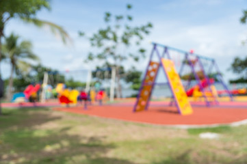 Fototapeta premium Blur of Colorful playground on yard in the park.