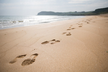 Foot prints in the beach