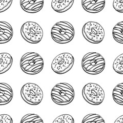 Seamless pattern with donuts.