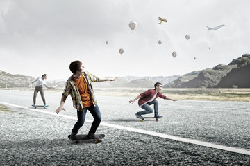 Teenagers ride skateboard . Mixed media