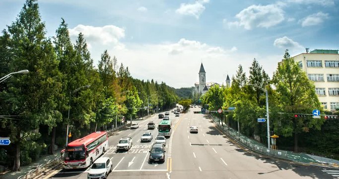 Gyeonggi-do, South Korea - August 13, 2016: Yul-dong Park close to the road time-lapse, South Korea