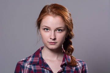 Serious girl looking at the camera