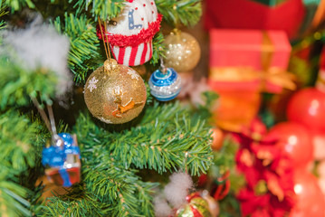 Decorated Christmas tree on blurred, sparkling