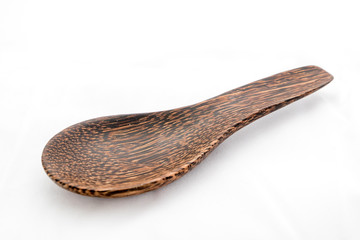 Wooden spoon isolated on white background
