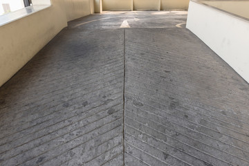 Empty parking deck with ramp i