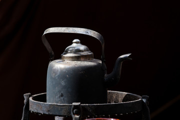Old black coffee pot