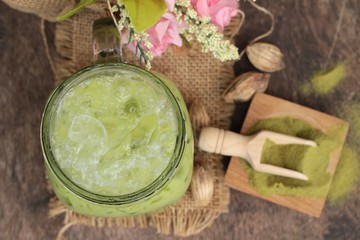 Iced green tea and matcha tea powder.