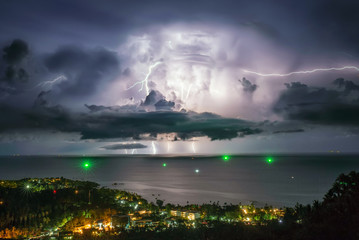 Naklejka na ściany i meble A storm with lightning in the sea, Thailand