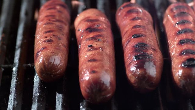 Hot dogs on grill, shot on Phantom Flex 4K