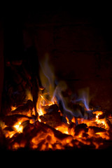 Fire in the fireplace. A good way of warming up the house with a romantic angle.