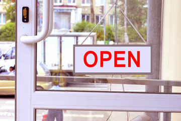 Fototapeta premium A sign with red letters on the front door