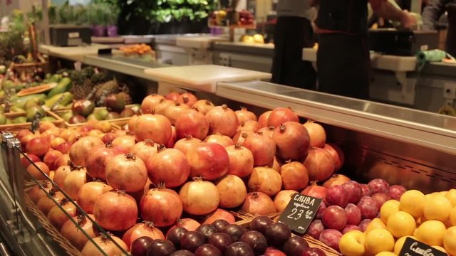 Counter with pomegranates and plums