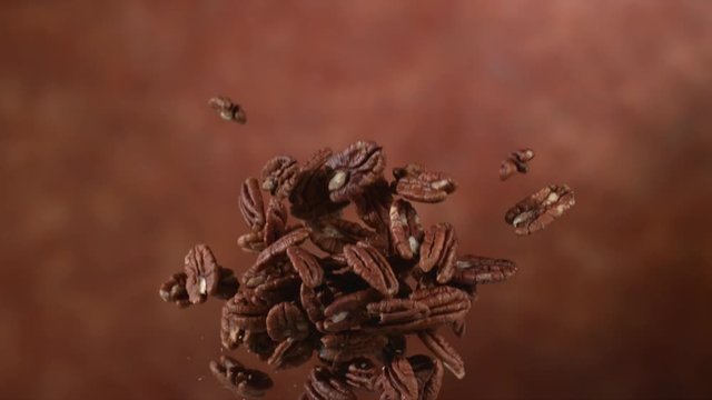 Pecan nuts flying in slow motion, shot on Phantom Flex 4K