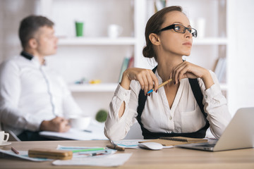 Attractive lady doing paperwork