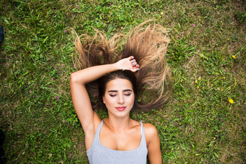 happy young woman on the grass