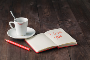 Love message on table with coffee
