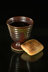 Cup of Wine and Bread on Table