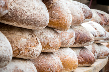 Many loaves of bread in a bakery