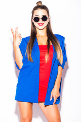 Naklejka premium Beauty sexy fashion model woman portrait wearing glasses, isolated on white background. Beautiful young brunette girl with trendy accessories posing in studio
