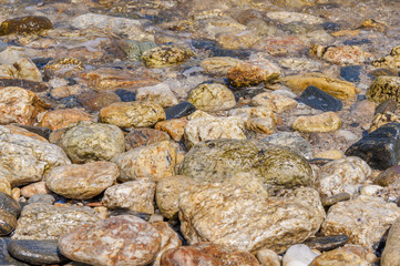 Stony sea shore sea background