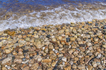 Stony sea shore sea background