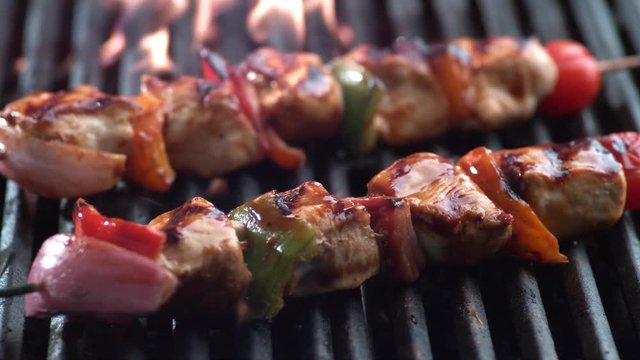 Chicken skewers on grill