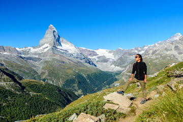 Fototapeta na wymiar Matterhorn - Hiker in beautiful landscape of Zermatt, Switzerlan
