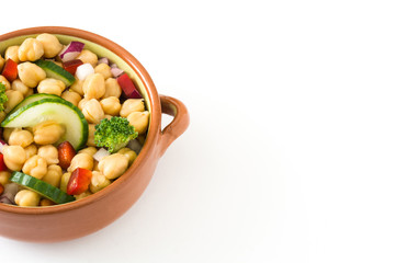 Chickpea salad in brown bowl isolated on white background

