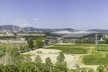 Suita City Football Stadium and Redhorse Osaka Wheel at Expocity in Osaka, Japan