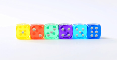 group of colored plastic dice