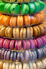 Colorful french sweets macarons in shop window