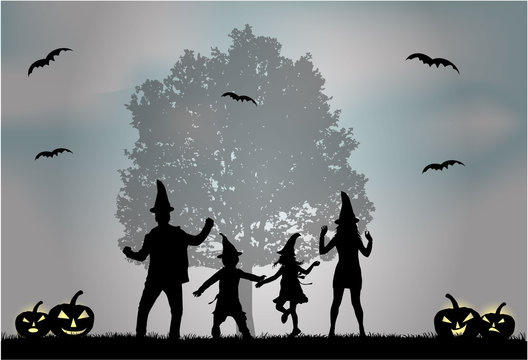 Halloween - silhouette of a family.