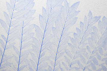 Blue leaves frosted glass texture as background