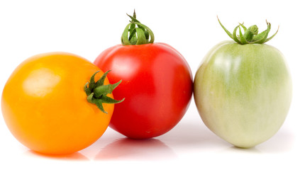 red yellow and green tomatoes isolated on white background