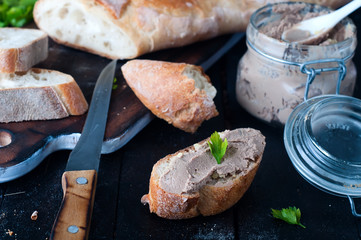 mousse, pate in a jar with baguette and parsley