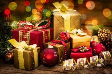 Christmas gifts on the wooden background 