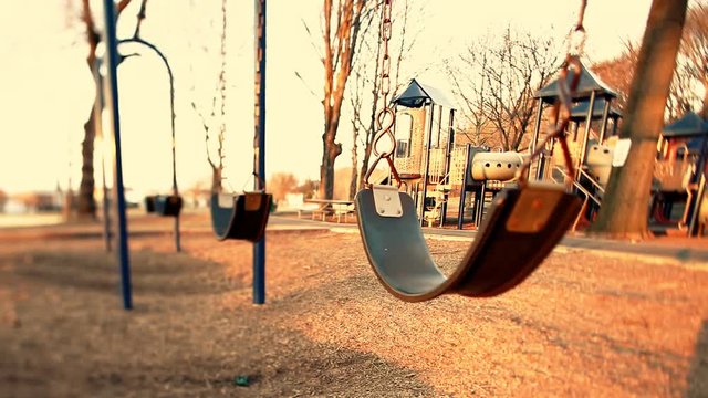  Abandoned swing at a playground 