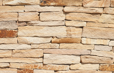 Natural rough stone wall texture for background