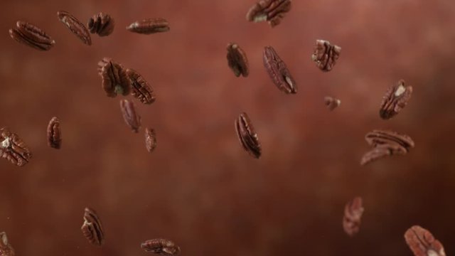 Pecan nuts flying in slow motion, shot on Phantom Flex 4K