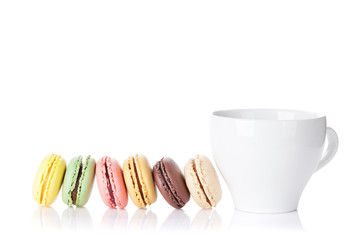 Colorful macaroons and cup