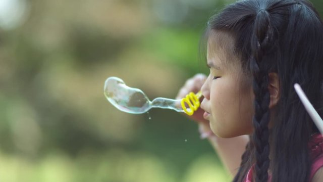 Girl in fairy princess costume blowing bubbles, shot on Phantom Flex 4K
