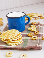 Mug of milk with cookies