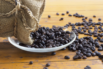 coffee beans and bag on white background