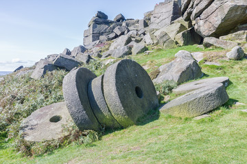 Abandoned millstones at Stanage Edge in Derbyshire, England.